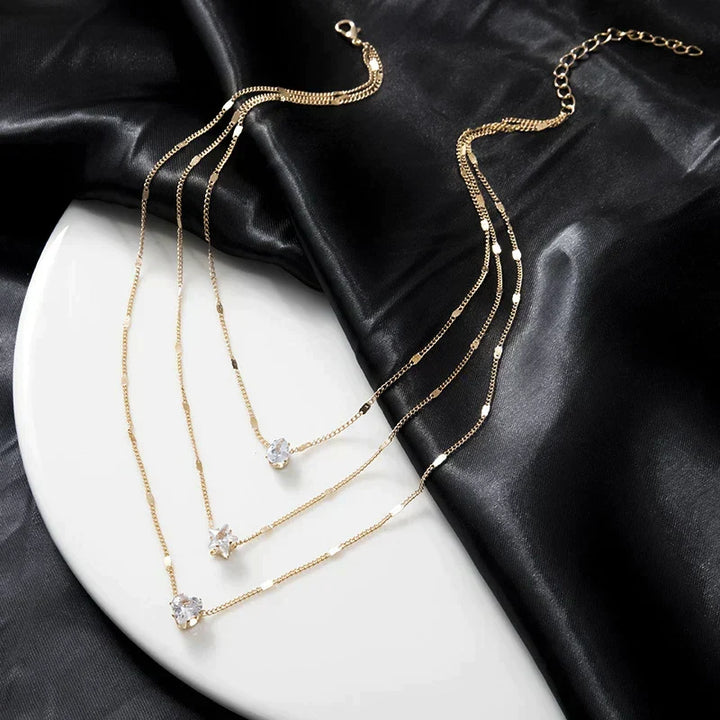 Drei-Pendant-Halskette mit Gold-Zirkonia