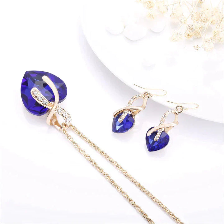 Set Halskette + Ohrringe der Liebe mit blauen Zirkonia in Gold