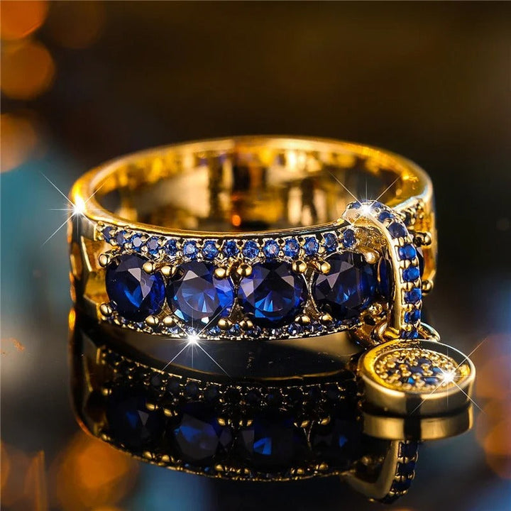 Antiker Gold- und blauer Kristall-Aussage-Ring